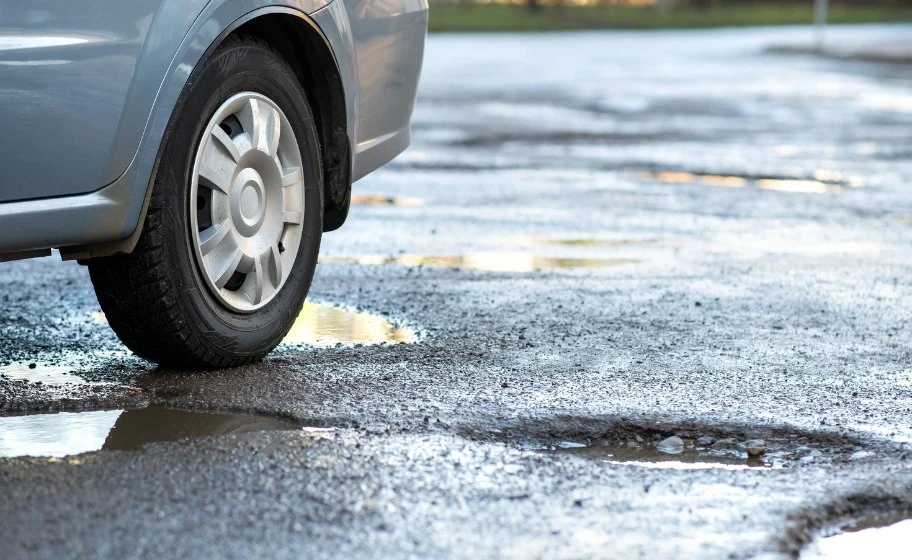 Electric Vehicles and Potholes: Are They More Vulnerable?